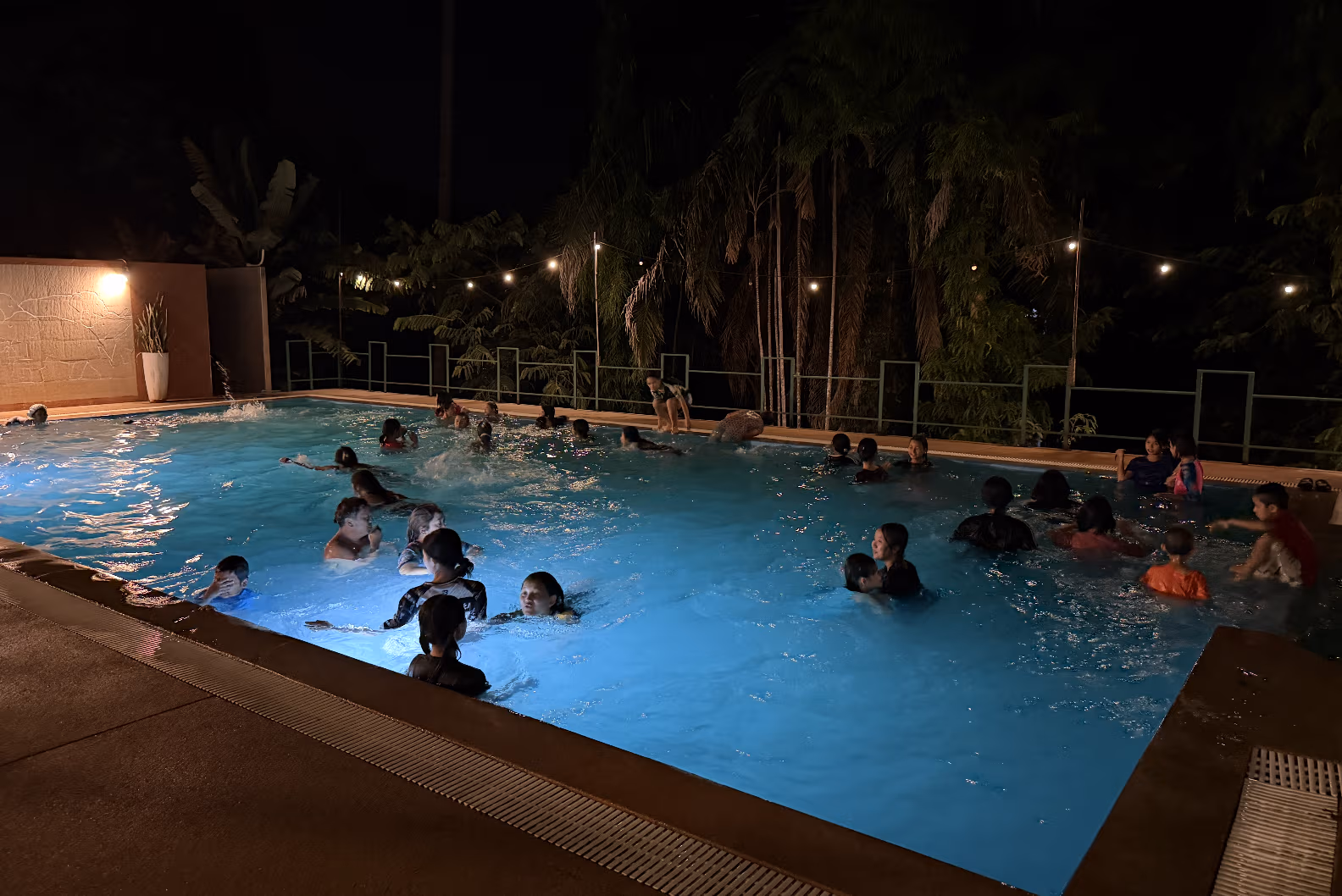 The Faith House girls and team at the night swim
